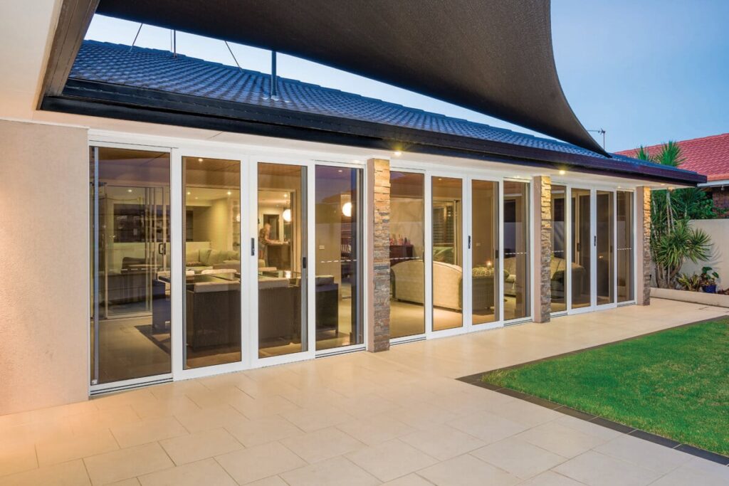 Crimsafe screens across a row of glass doors