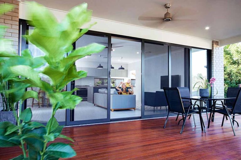 Crimsafe sliding doors opening to a deck